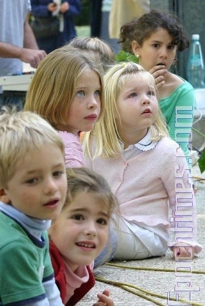 Музыка детей завораживает. Фото:Чжан Юэ.Epochtimes.com